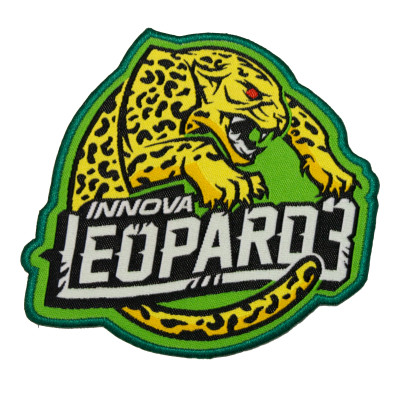 Innova Leopard3 Patch. Shows a black-spotted yellow cat with red eyes and a fierce growl leaping over the words "Innova Leopard3" on a green background.